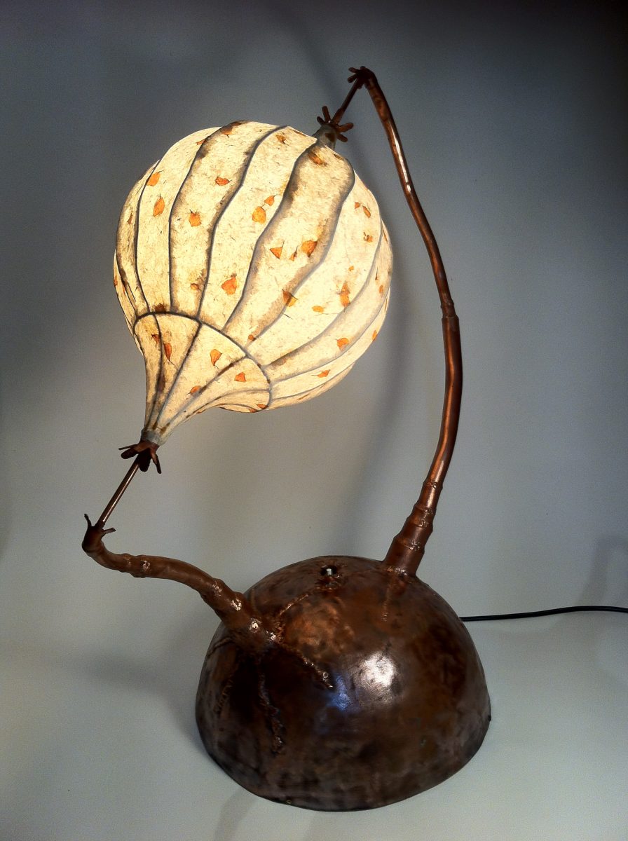 Quirky sculptural lamp made from recycled copper
