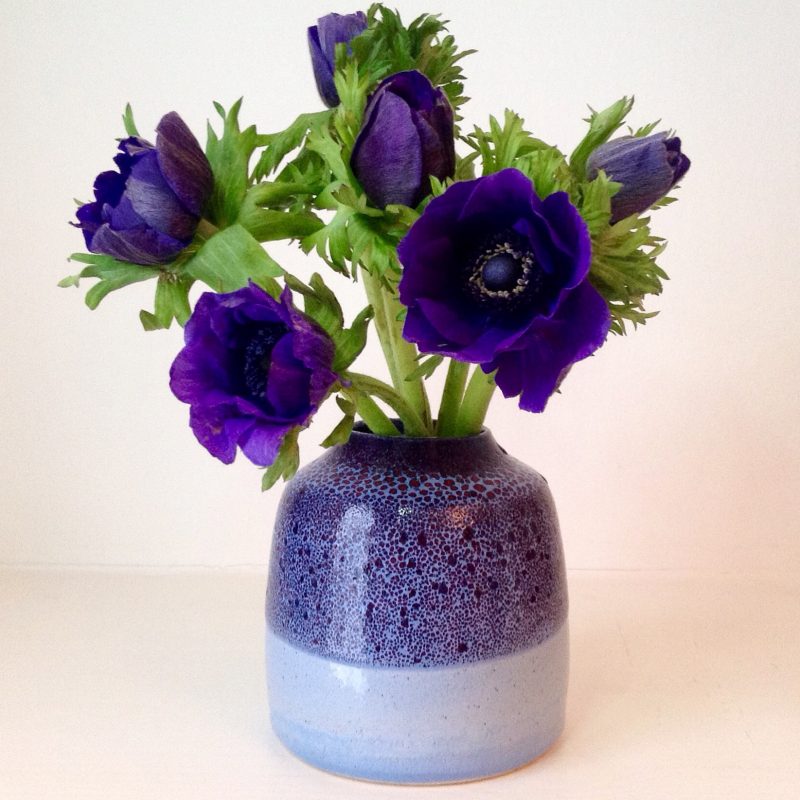 Stoneware vase with multiple glazes in purple and blue