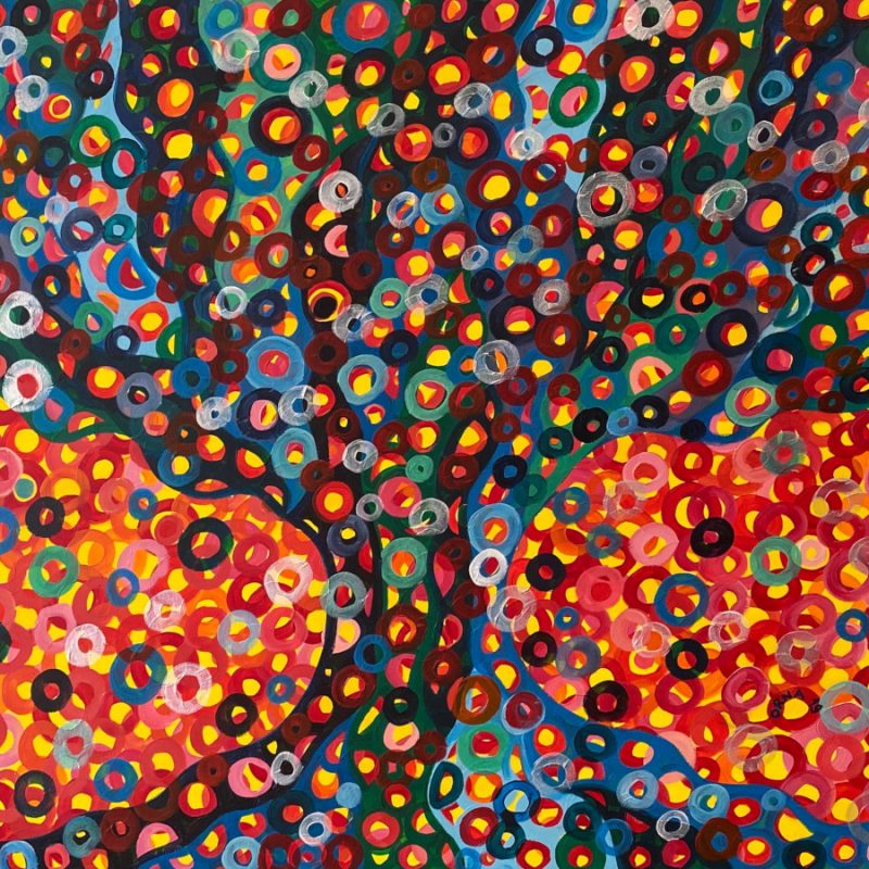 An abstract painting of a tree covered in colourful circles