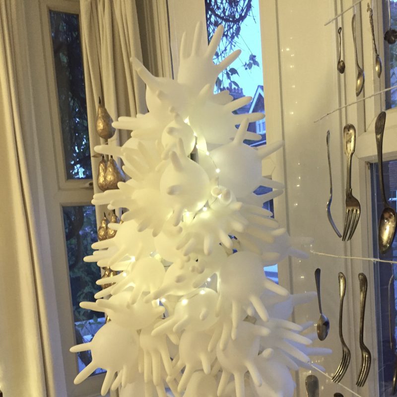 An xmas tree made of blown up rubber gloves
