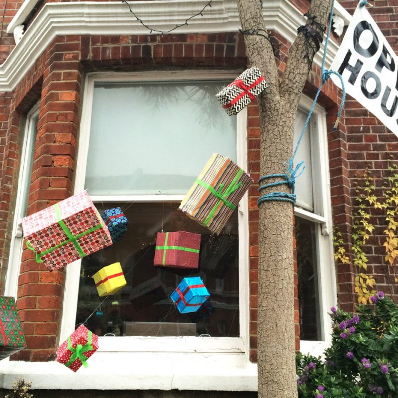 Exterior of a house with flying xmas presents 