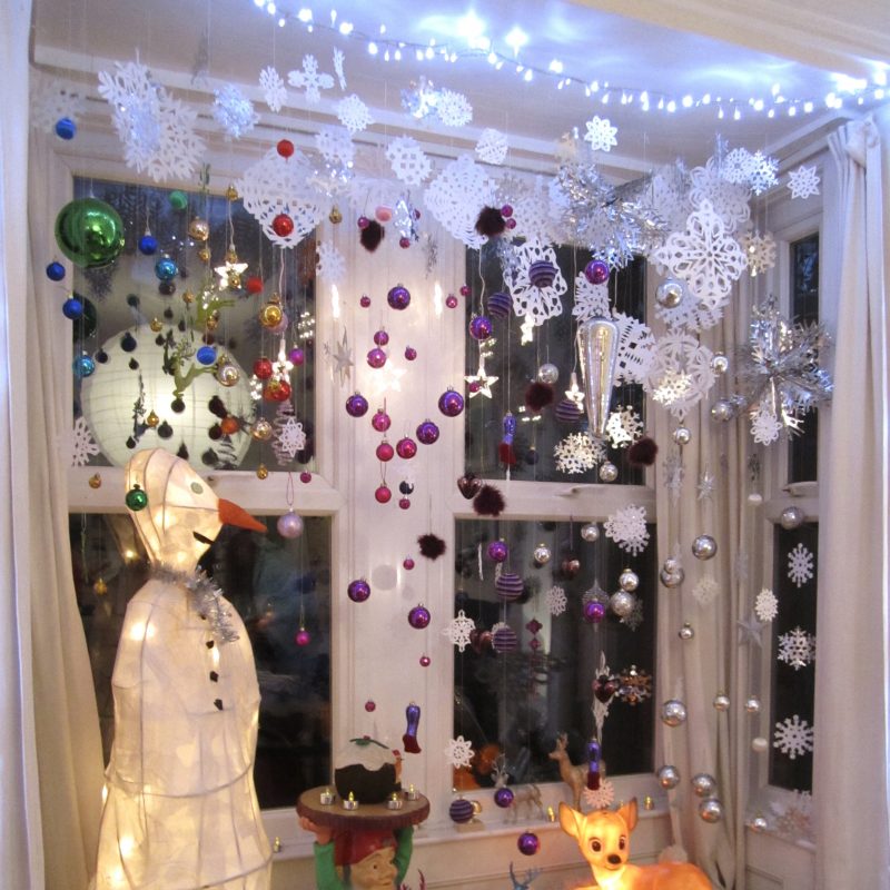 Interior xmas grotto with decorations, a snowman and bambi 