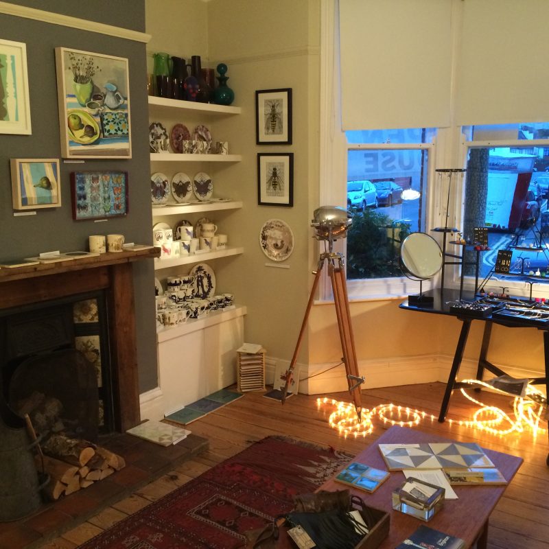 An interior of the open house exhibition with Paintings, prints and cards