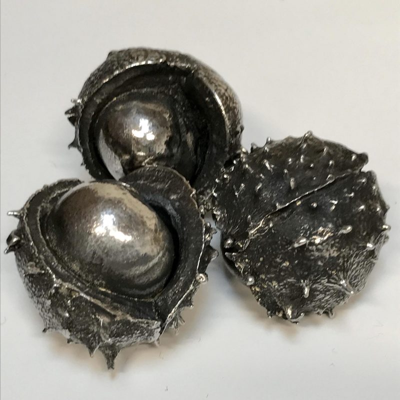 Decorative pewter conker made in lead free pewter.  Height: 3.5cm; Width: 4cm Depth: 3cm