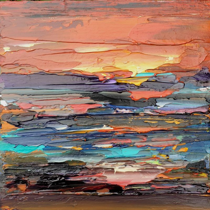Thick layers of Acrylic paint which look like a sunset landscape