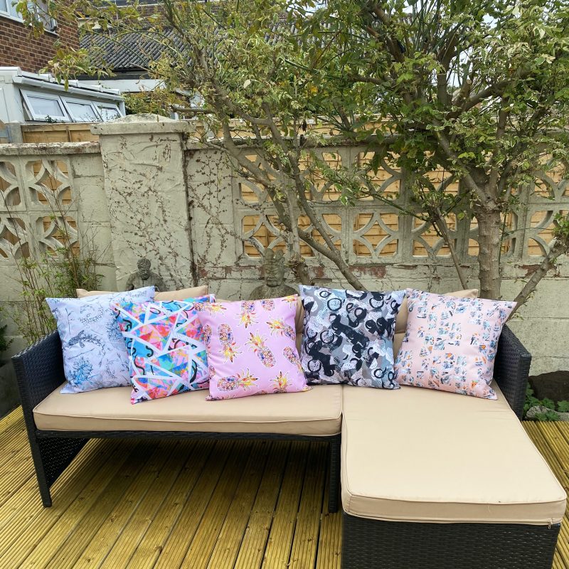 Photograph showing outdoor seating with five designs of outdoor cushions