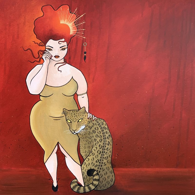 A voluptuous redhead with a fancy headdress stands beside her tame leopard.