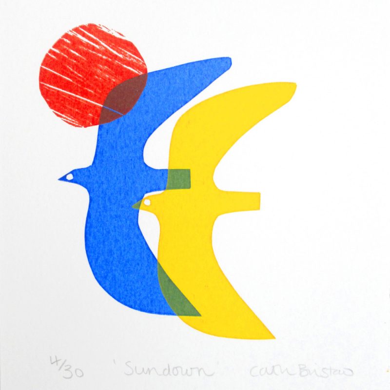 A description of the image for the Visually Impaired audience - This is an image of two bird, one blue and one yellow. The birds are flying close together and parts of their wings overlap creating a dark blue green colour were they touch. To the left of the two birds is a bright orange sun. The background is white.