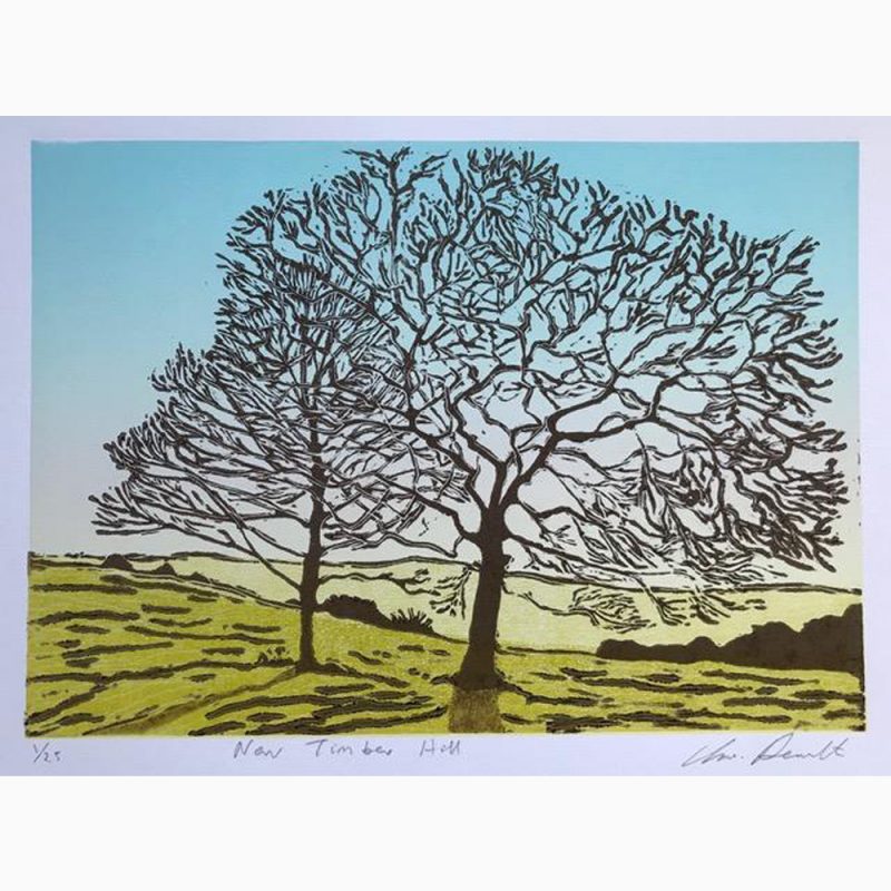 Linocut of tree with sunset behind