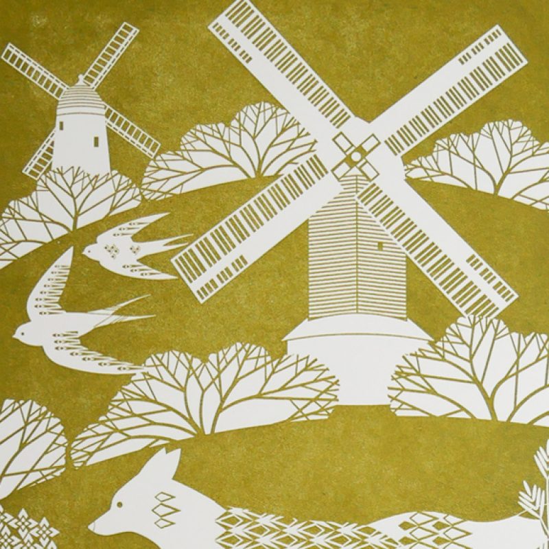 olive letterpress print of a fox running across the south downs, jack and jill windmills in the background