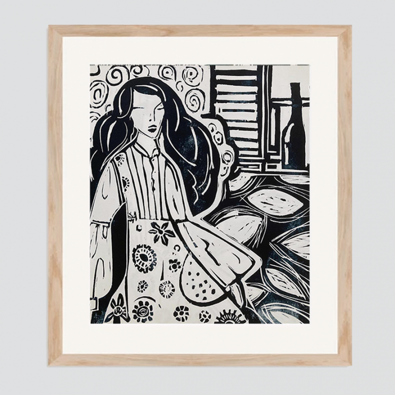 The image is of a long haired woman recling at home, wearing a simple bell sleeve dress by a wall with swirling wall paper & a shuttered window with a wine bottle.  The print is very dark navy on an off white ground 
