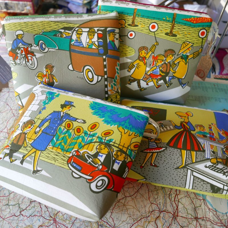 large fabric pouches with zip tops made with bright sixties fabrics