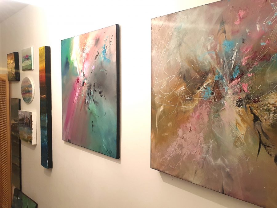 Image of one wall with paintings from my open house 