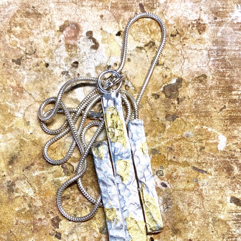 Pendant in gold and silver