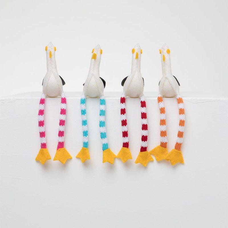 Small felt seagulls with knitted striped legs, available in four colours, turquoise, pink, orange and red