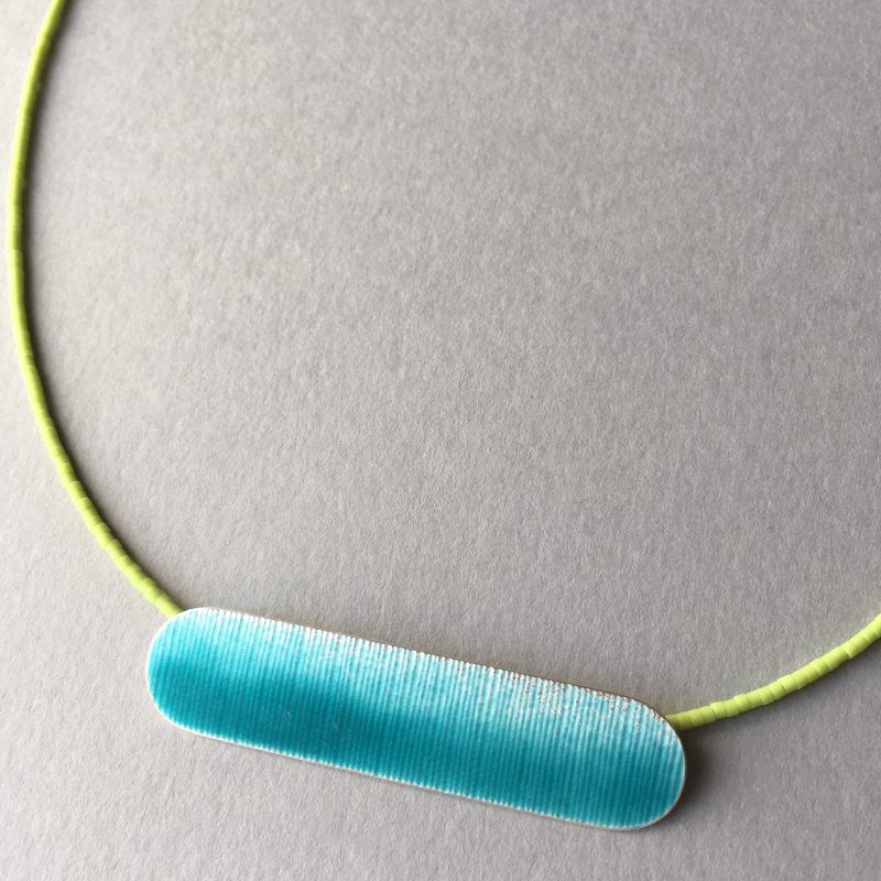 Deep turquoise enamel and silver horizontal shape necklace