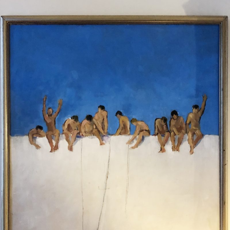 Painting of naked men fishing on a white wall with a blue sky behind