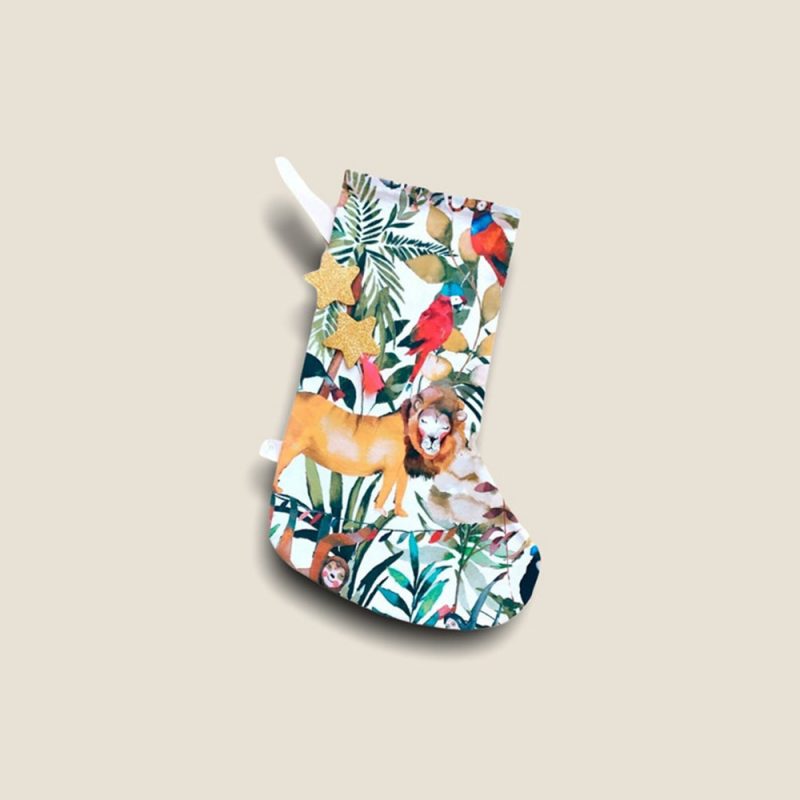 Christmas stocking covered with illustrations of the jungle, bright and vibrant. 