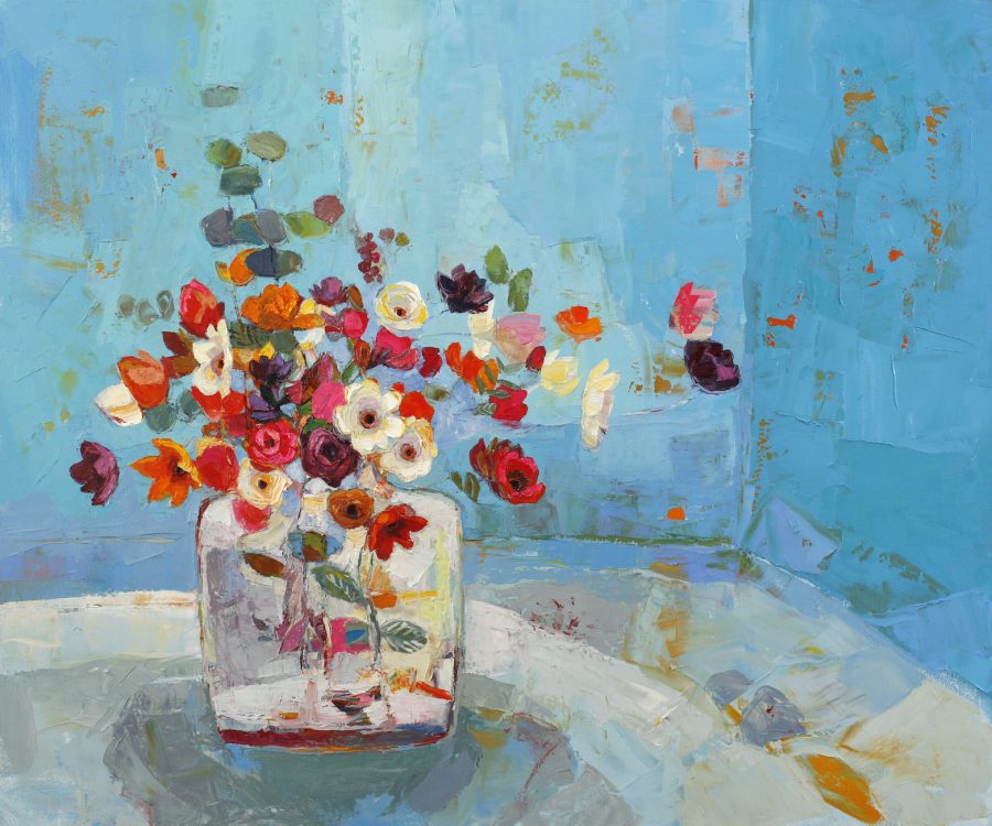 A brightly coloured Still Life of flowers in a square jug.