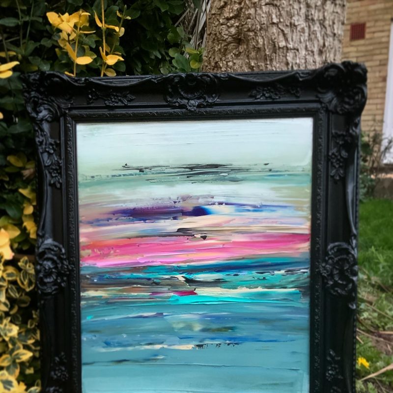 Abstract landscape, horizontal palette knife strokes, blues and reds in black baroque frame