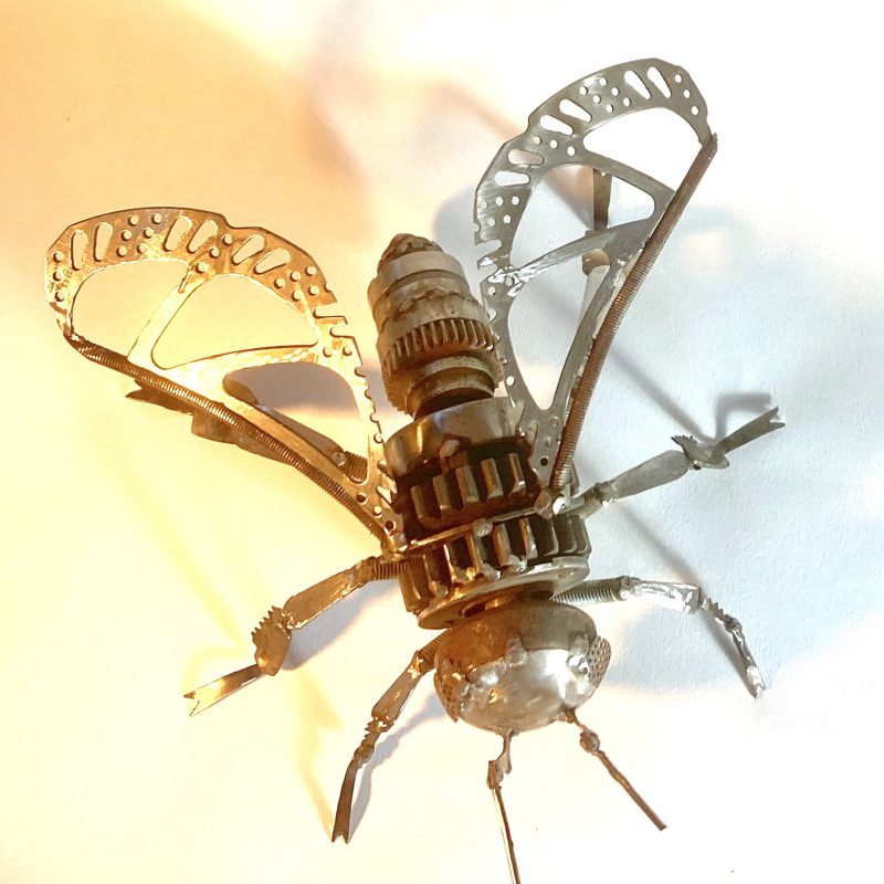 scrap metal sculpture of a bee