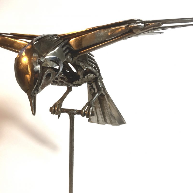 scrap metal sculpture of a thrush