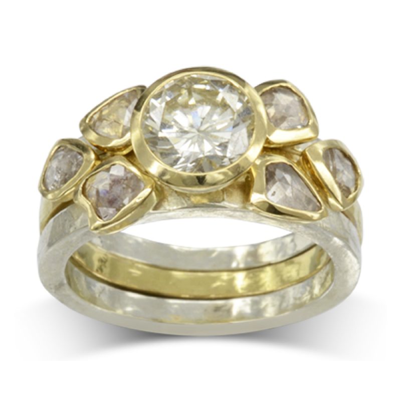 Stacking Rings featuring a 1ct round brilliant cut diamond and six rough diamonds, in platinum and 18ct yellow gold.