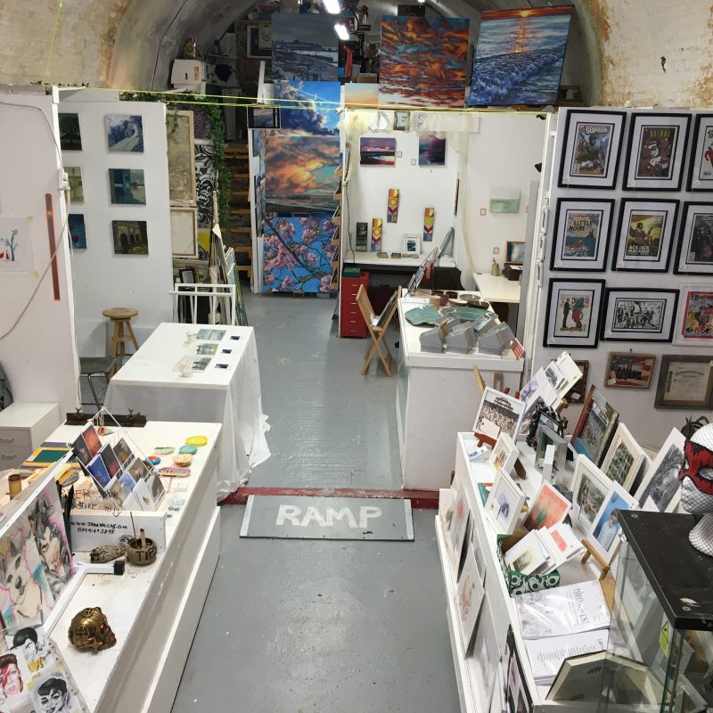 View of the inside of the Open Studio. Individual artist units and display areas