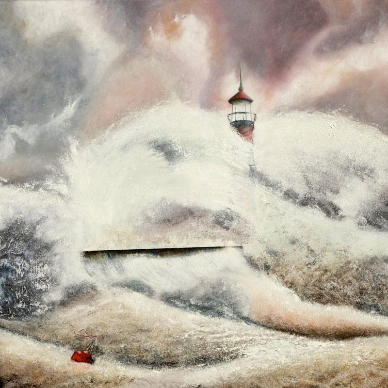 The top of a lighthouse is seen above huge waves and a roiling sea.