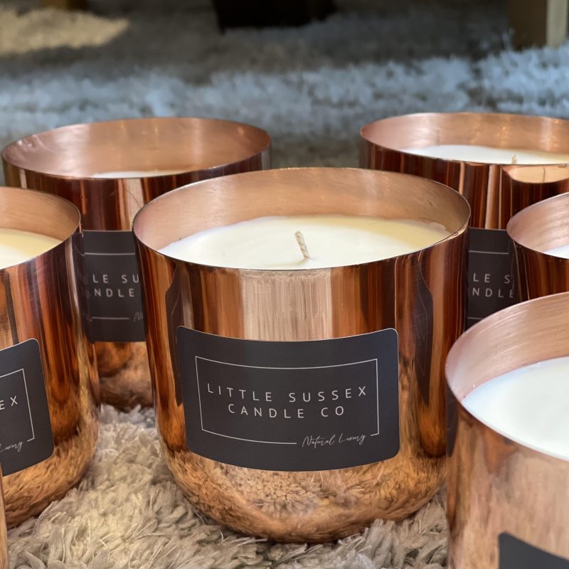 Hand poured candles in bronze  container