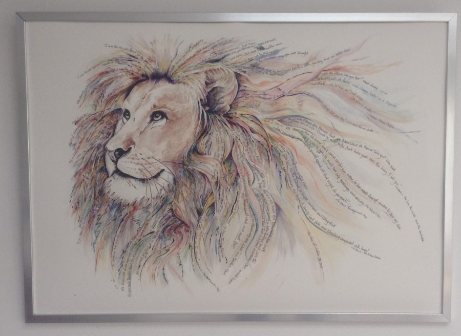 Lion's head and mane with quotes from the Narnia stories describing the character of Aslan interwoven within the mane.