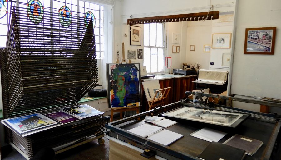 Image of inside North Star Studio Ltd. showing print facilities and artwork displayed in surrounding space.