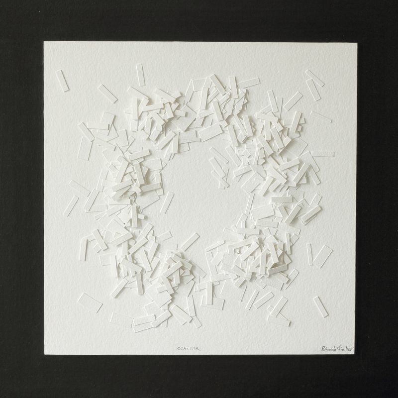 3D low relief paper pieces scattered.