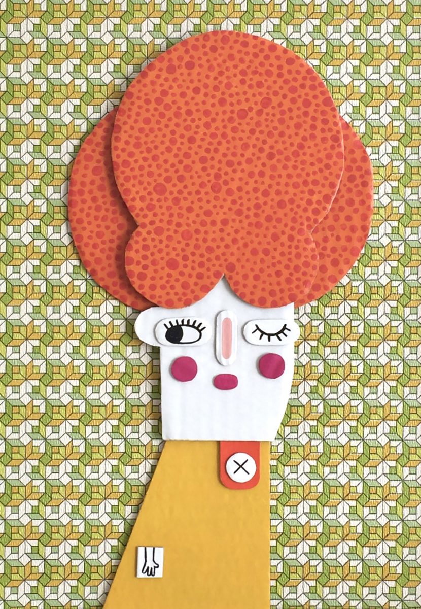 A colourful girl with big orange hair and yellow coat made from painted cardboard mounted on bright vintage wallpaper