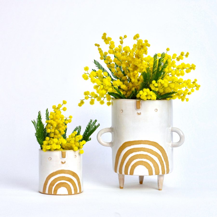 Two vases with charming faces