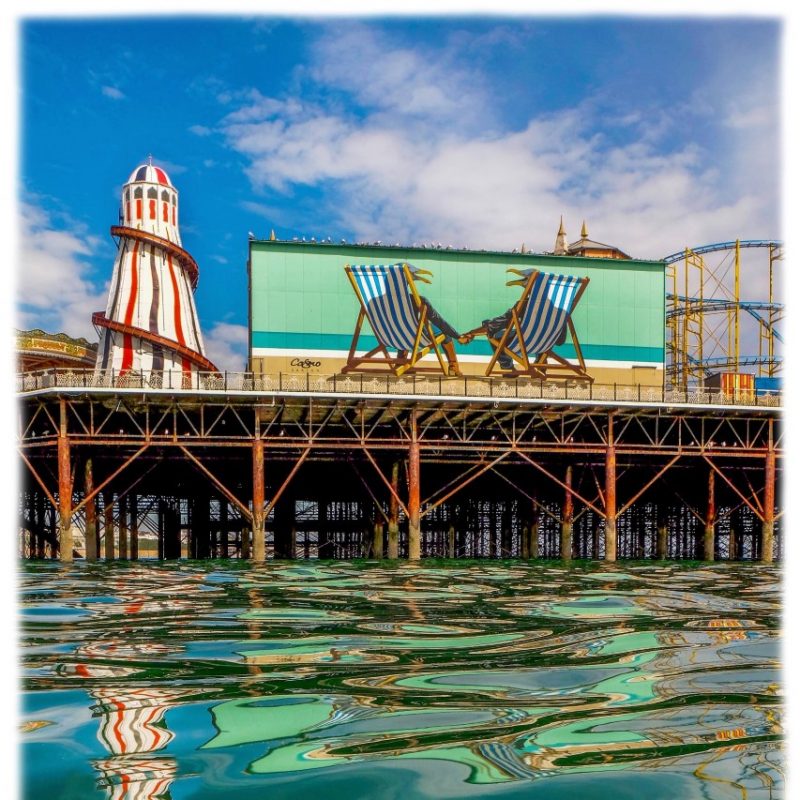 A view of the Iconic, Brighton Pier Helter Scelter from translucent,sea level.
