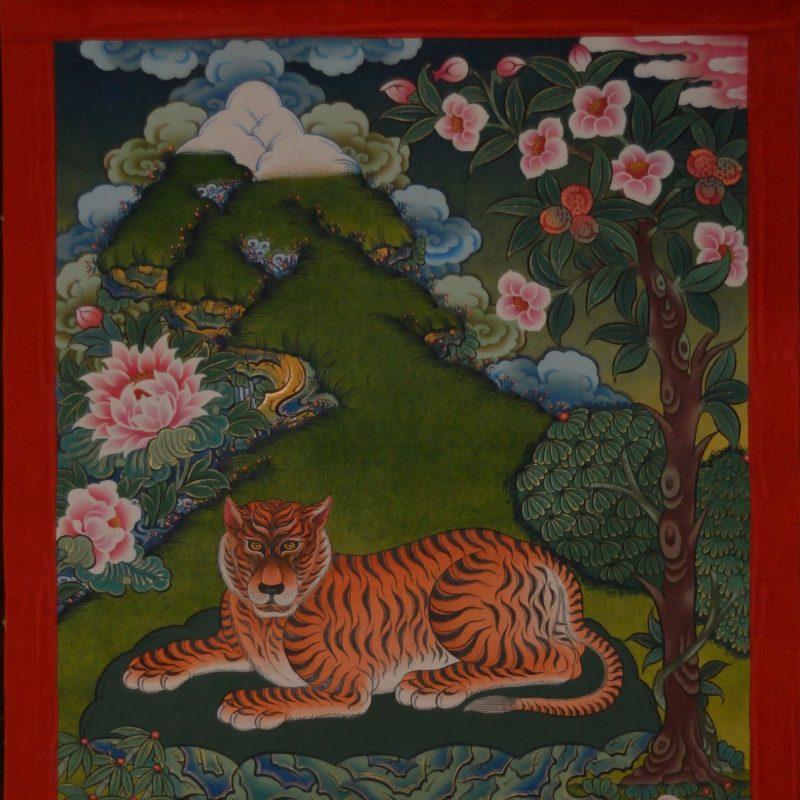 Tiger guards the mountain with flowers, greenery and white clouds