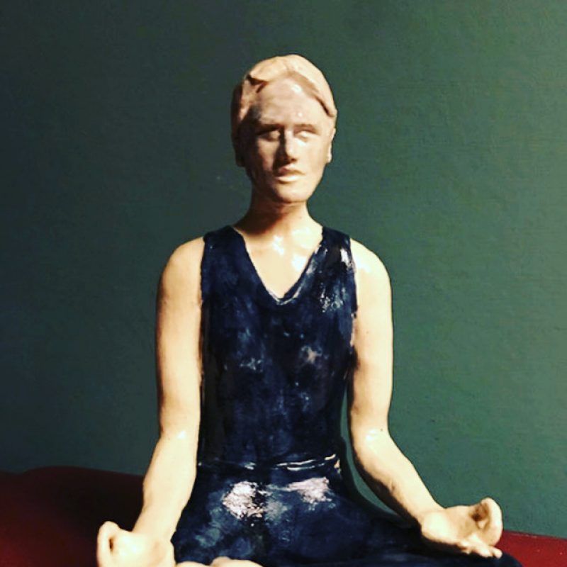 Yoga sculpture in meditation position