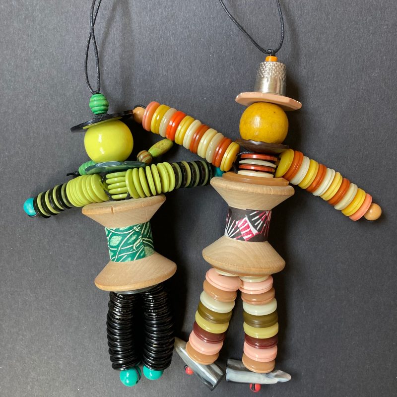 Hanging decorations made from wooden beads, buttons and toggles