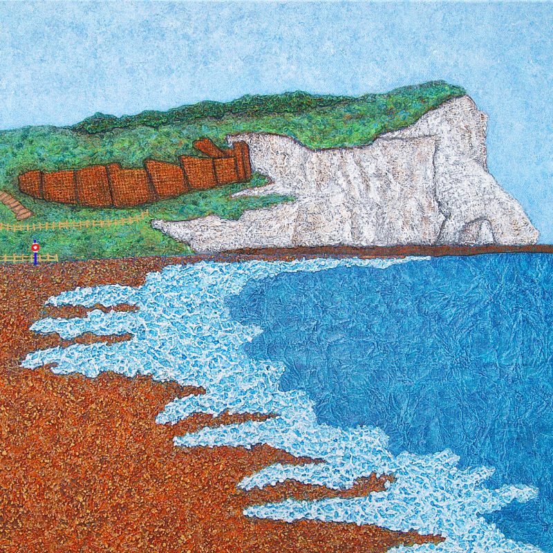 Colourful highly textured collage and painting of Seaford Beach with chalk cliffs, pebbles and beach huts