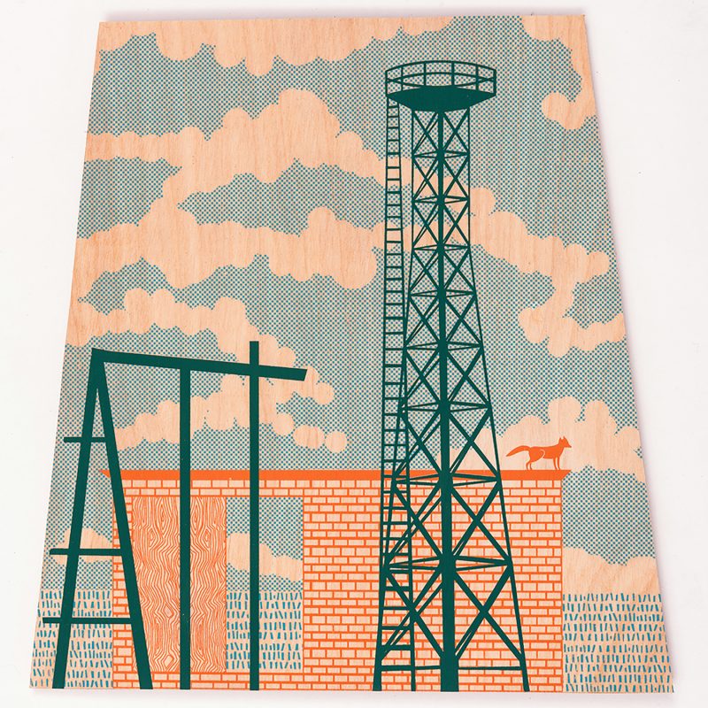 A screenprinted image of an industrial landscape onto plywood