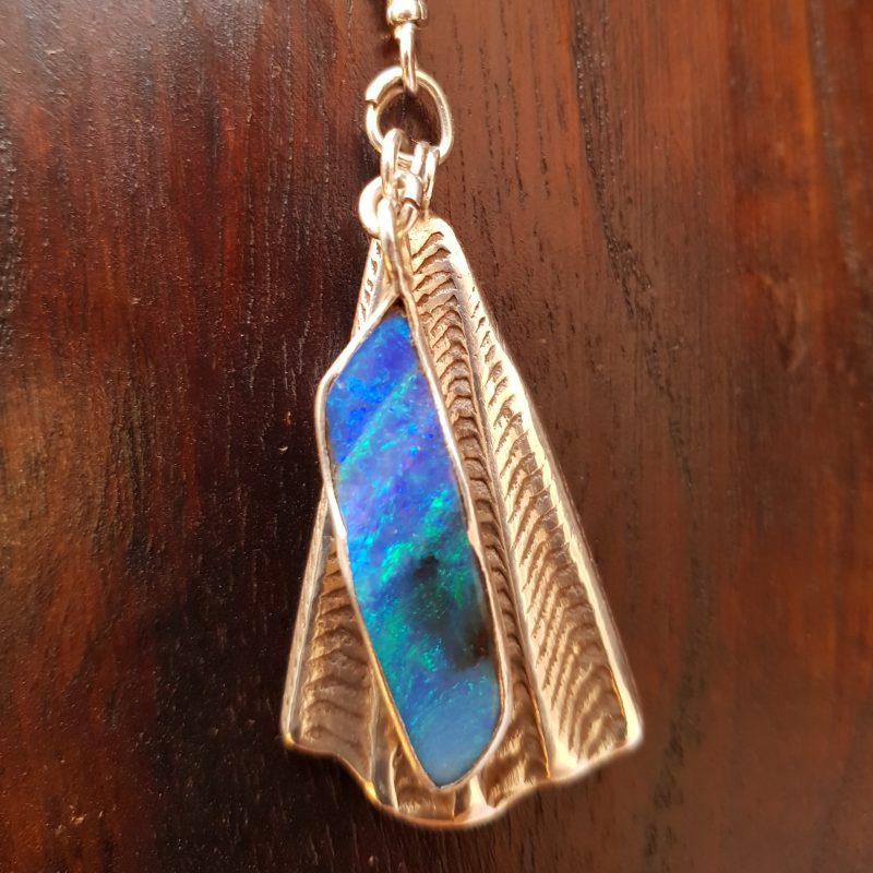 silver pendant with opal