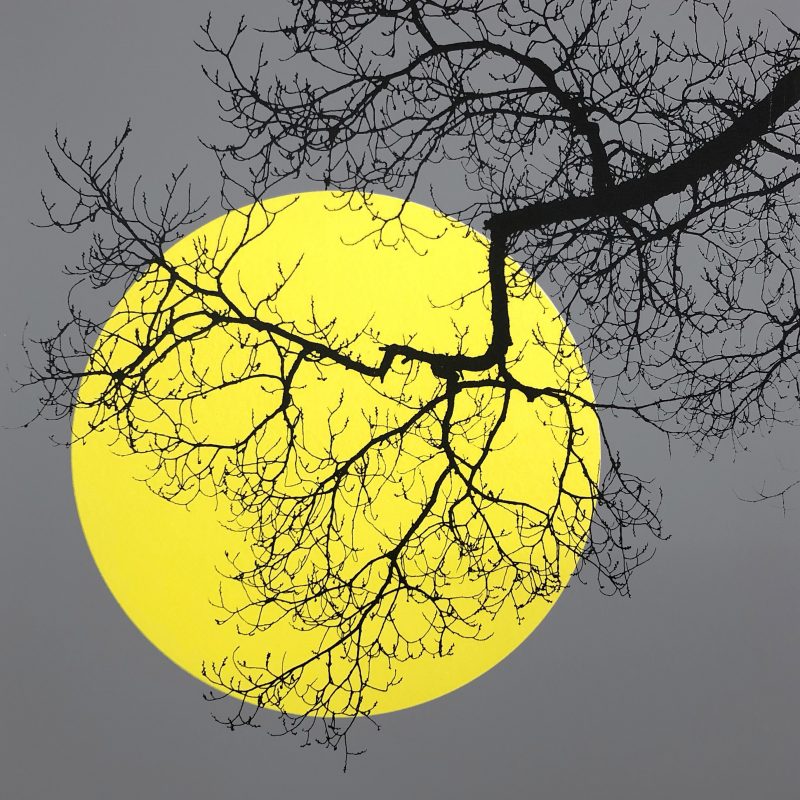 A semi abstract screenprint depicted silhouetted branches against a yellow moon on a grey sky
