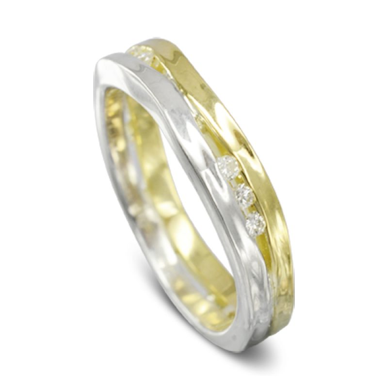 Two side hammered bands of gold, one white one yellow, set in between with 1.5mm round diamonds. 4mm wide.