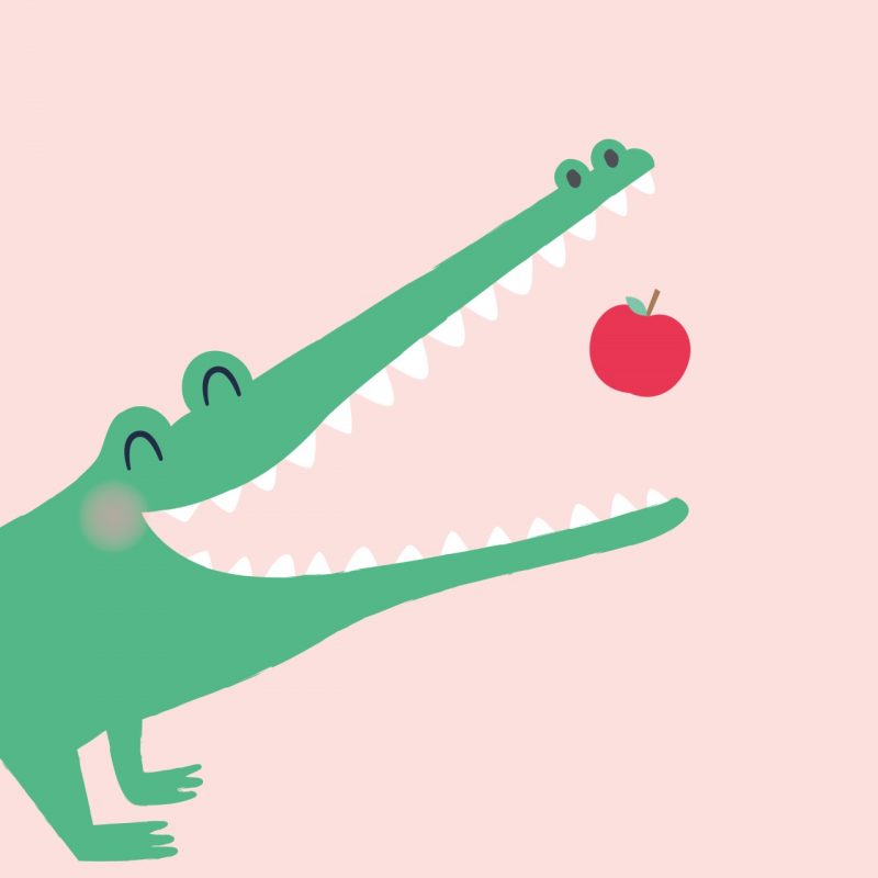 A decor art print on Best quality paper of a green crocodile eating a red apple with a pink background. Stylised and suitable for a children's bedroom.