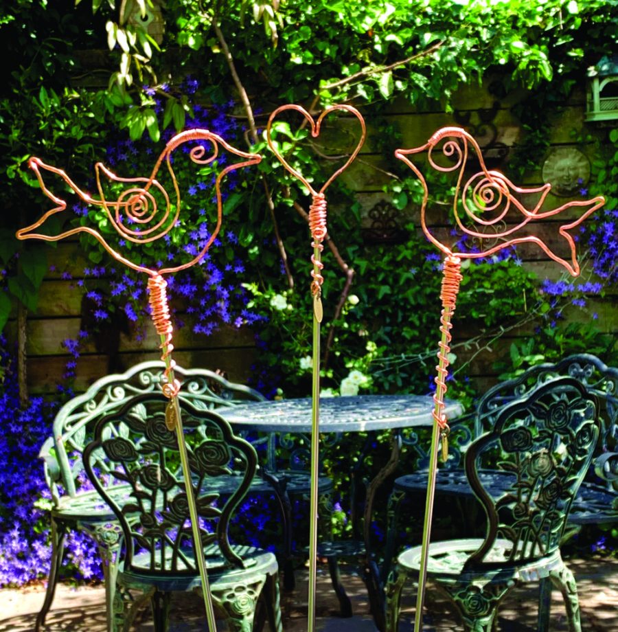 Hammered and Twisted Copper Sculptures of Love Birds with a heart by Brighton Artist and Designer-Maker Troy Ohlson