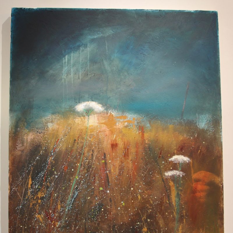 Painting of a golden field of flowers with a dark blue sky