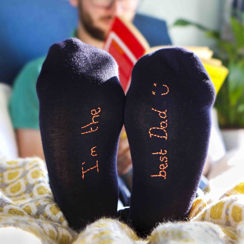 Mens navy socks with, 'I'm the best dad' hand embroidered on the soles