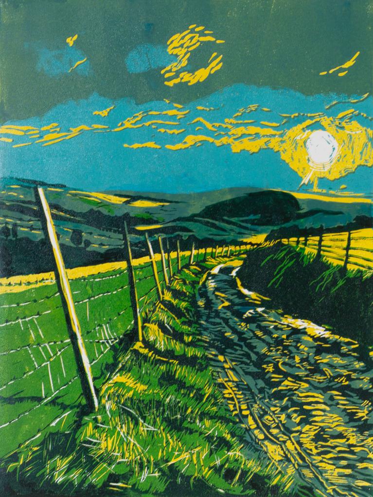A reduction lino made with blue, yellow and green ink, depicting a local view on the South Downs. The view is full of bright sunlight in Spring following a storm.