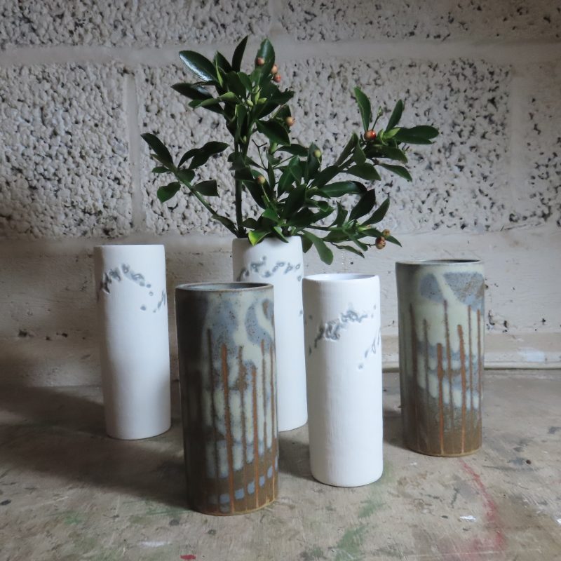 Selection of handmade vases in white and grey ceramics. Chalk and flint colours.  Ideal vases for garden flowers. Tactile to feel.
